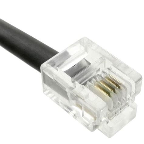 Imagen de un conector RJ11 conectado a un teléfono.