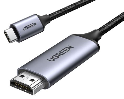 Cable USB-C a HDMI conectado a un portátil y un monitor