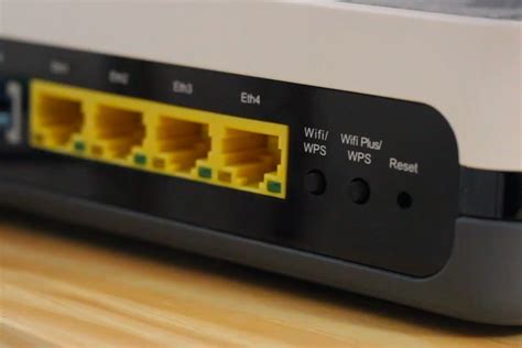 Router con botón WPS visible