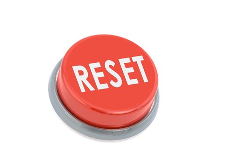 Diagrama mostrando cómo usar un clip para presionar el botón de reset
