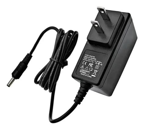 Imagen de un adaptador de corriente de router