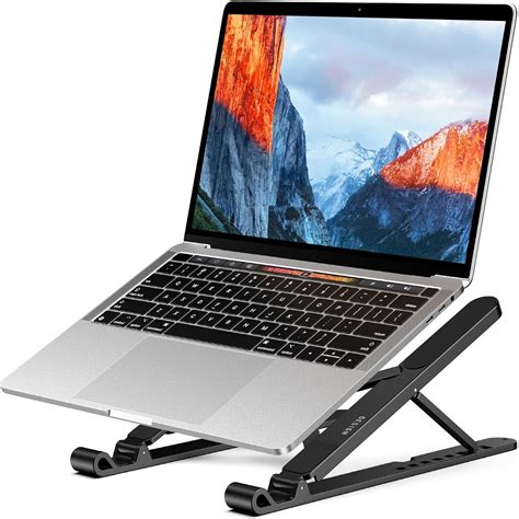 Soporte ergonómico para portátil y teléfono móvil